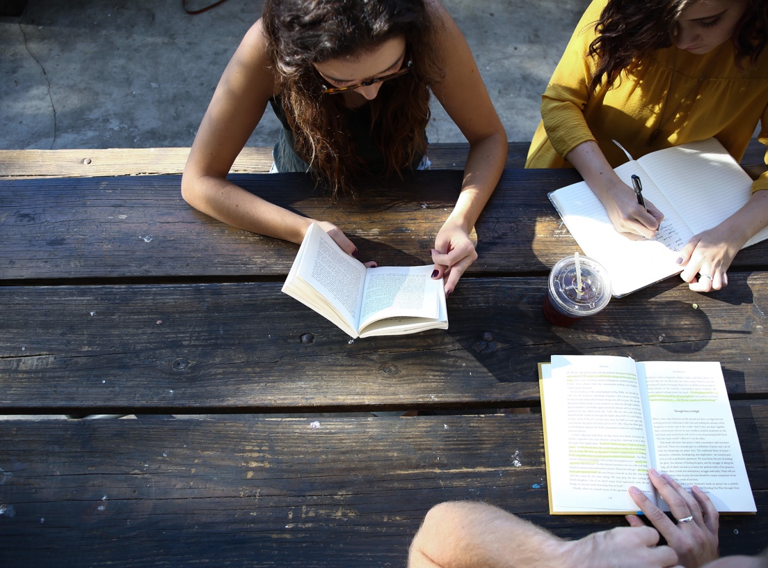 girls studying at a table